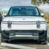 Uber will operate its own robotaxis again—this time with Rivian’s not‑yet‑built EVs