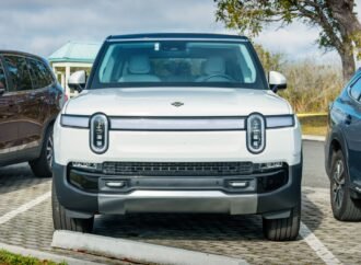 Uber will operate its own robotaxis again—this time with Rivian’s not‑yet‑built EVs