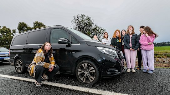 Driver Rachel Welsh with her car and passengers who suffered a puncture.