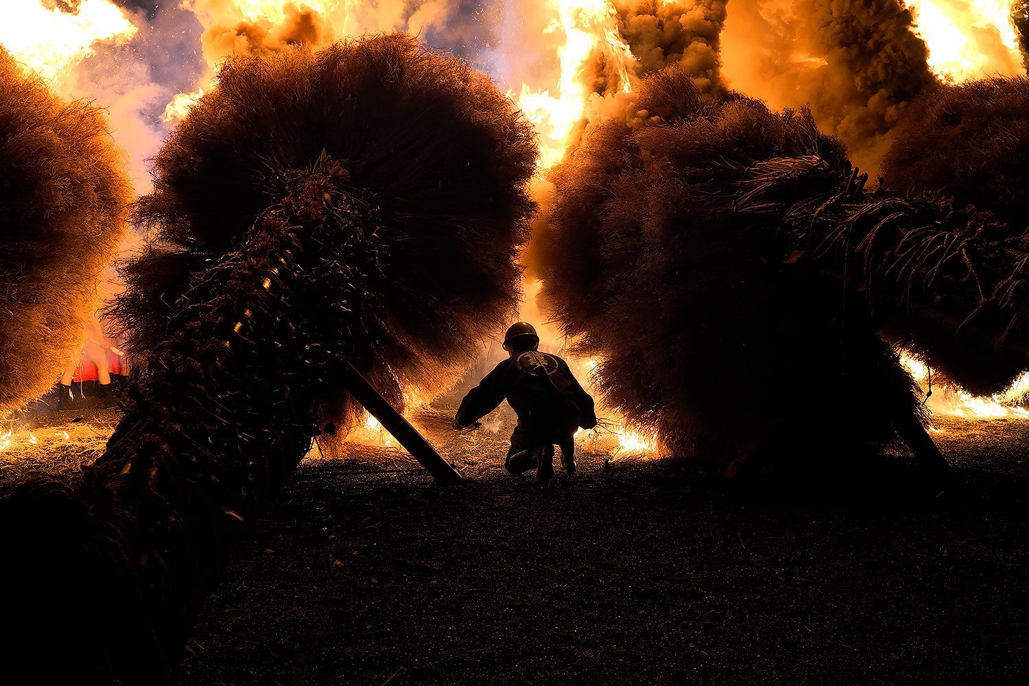 a firefighter under the flames