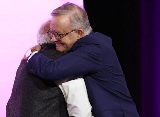 Indian Prime Minister Narendra Modi and Prime Minister Anthony Albanese embrace Thursday morning.