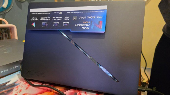 Back of laptop showing the funky linear white light on the back.