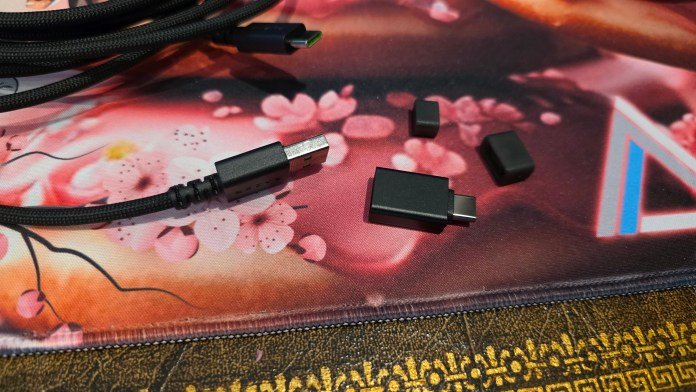 The UBS-A cable is shown next to a mini USB-A to USB-C adapter.
