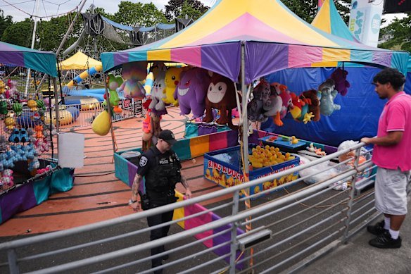 A police officer on patrol after a shooting at Seattle Center during the Bite of Seattle food festival.