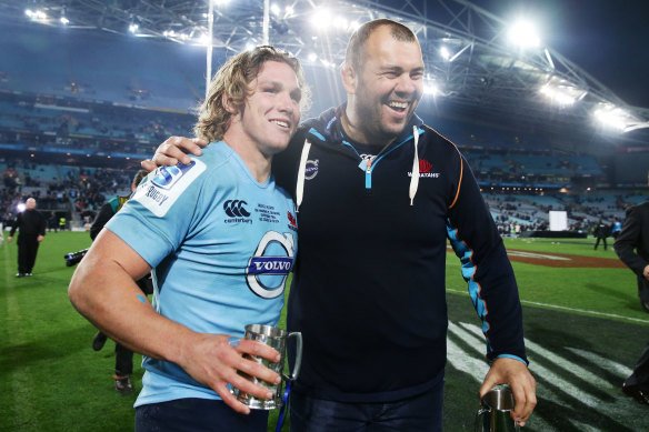 Michael Cheika and Michael Hooper celebrate victory over the Crusaders in the 2014 Super Rugby decider.
