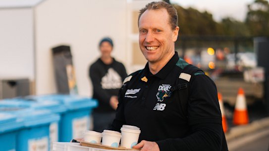Matthew Knights makes his beloved coffee with the Tasmania Devils.