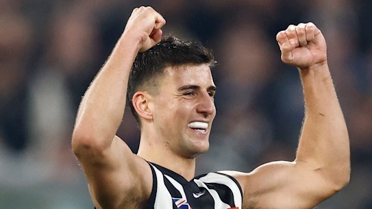 Nick Daicos of the Magpies celebrates.
