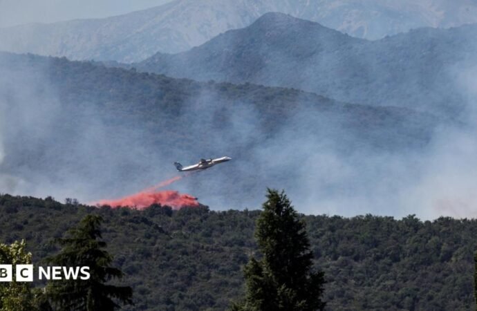 A forest fire in the south of France forces the evacuation of 10,000 people