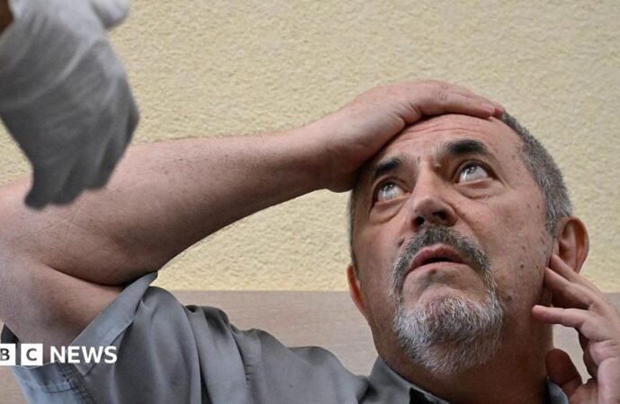 Anti-war critic fined, another detained as Russia clamps down on opponents