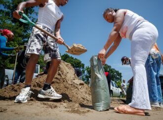 Beaches closed and sandbags filled as Tropical Storm Bertha approaches the Gulf Coast