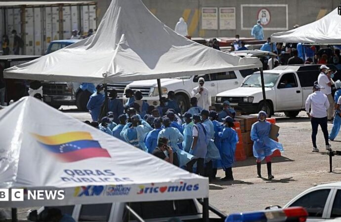 Distraught families must identify Venezuela earthquake victims in makeshift morgue