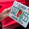 Elderly American woman is surprised to receive a bold new license plate