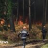French wildland fire crews face scorching heat in battle to contain flames