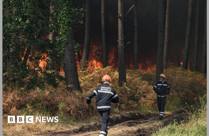 French wildland fire crews face scorching heat in battle to contain flames