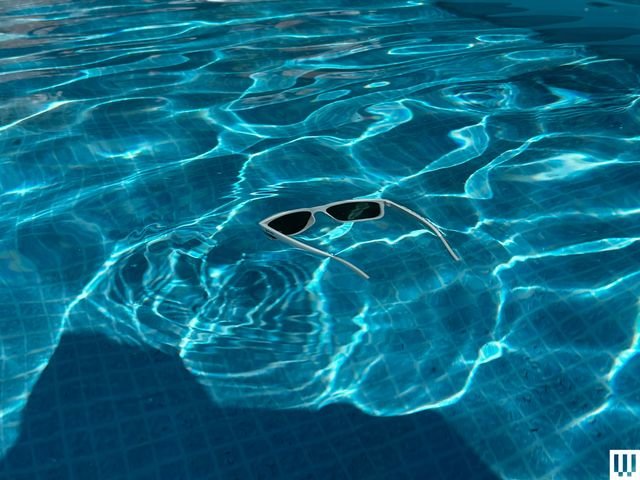 Image may contain: pool, water, leisure activities, person, sport, swimming, water sports, pool, outdoor and land
