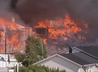 Helicopters drop water as massive fire in Norway destroys homes