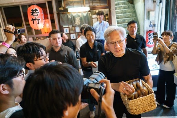 Jensen Huang hands out red bean buns to Tokyo crowds in his latest culinary adventure