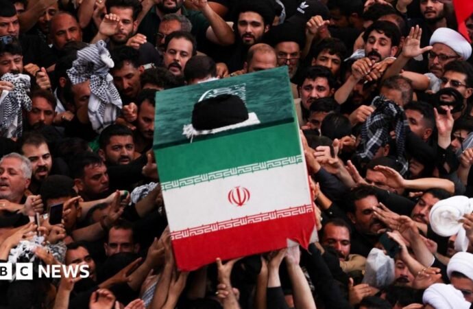Khamenei’s coffin is carried through Shiite shrines during ceremonies in Iraq