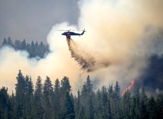 Oregon firefighters prepare for hot, windy weather as they battle dozens of fires