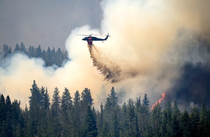 Oregon firefighters prepare for hot, windy weather as they battle dozens of fires
