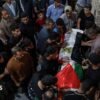 Palestinians mourn the death of organizer of World Cup screenings in Gaza in Israeli attack