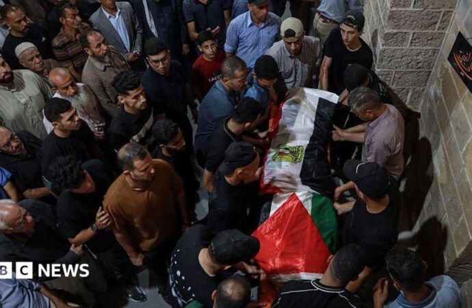 Palestinians mourn the death of organizer of World Cup screenings in Gaza in Israeli attack
