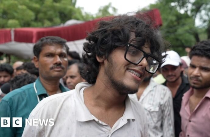 Protesters celebrate resignation of India’s education minister