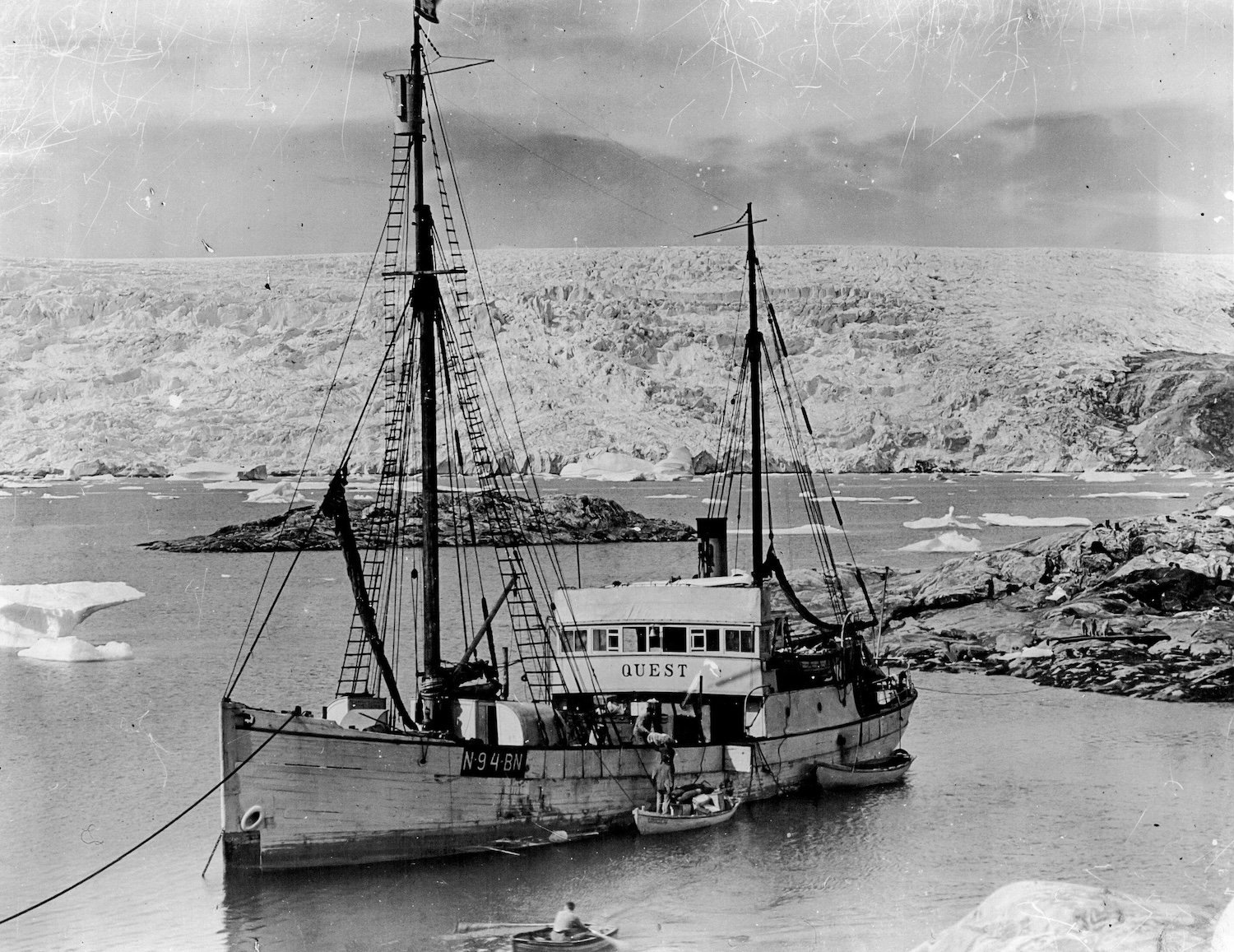 2HX6451 British Arctic Flyway Expedition: The Quest, the ship of the late Sir Ernest Shackleton who died in Antarctica, the expedition ship in base fjord with glacier in the background. August 29, 1930. (Photograph of the British expedition along the Arctic air route).