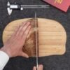 This German seeks to cut the perfect slice of bread