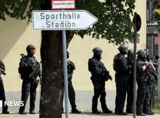 Two girls seriously injured in an attack on a German school.