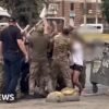 Why do Ukrainian military recruiters face violence in their own country?