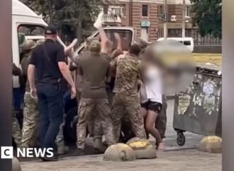 Why do Ukrainian military recruiters face violence in their own country?