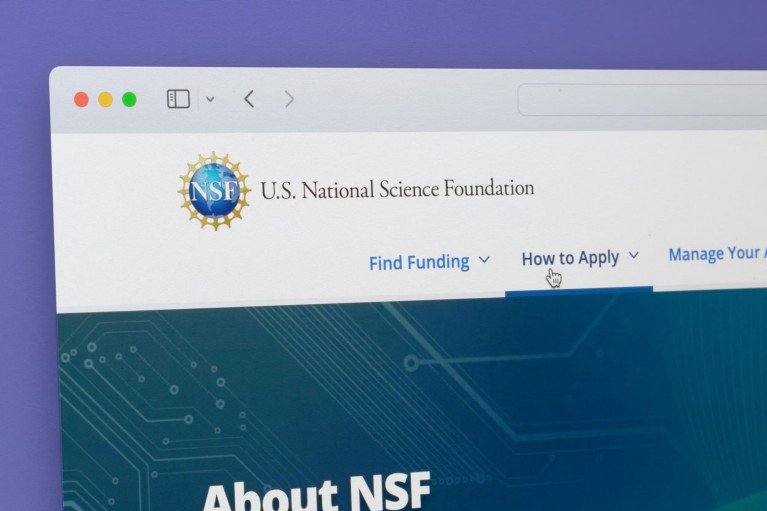 A photograph of a computer screen displaying the US National Science Foundation (NSF) website in a web browser.