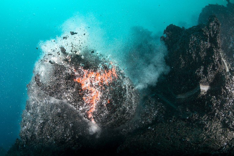 Pillow lava forming from an underwater fissure in Hawaii.