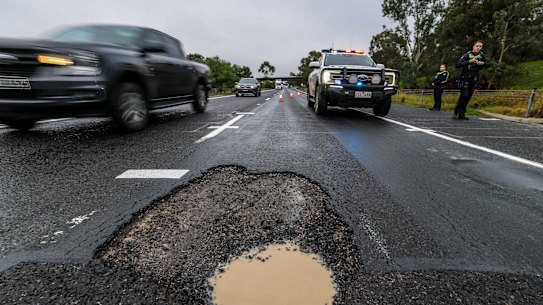 Last week, a pothole on the Hume Highway caused five cars to suffer punctures in quick succession. In regional Victoria there is anger over the state of the roads. 