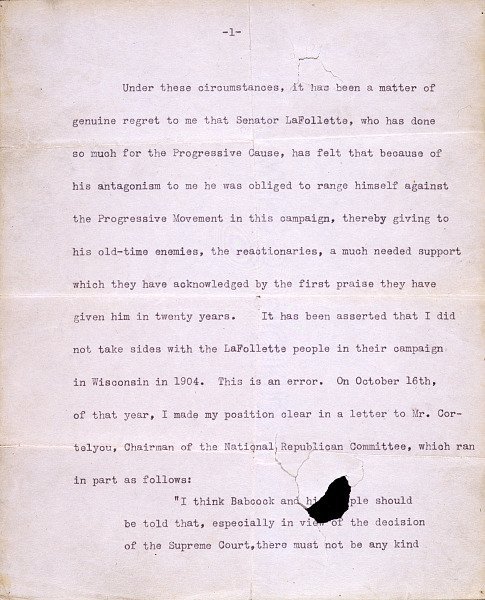 A page from Roosevelt's life-saving speech with a bullet hole facing down
