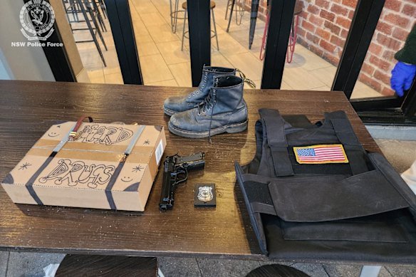 Mastrocinque allegedly wore a ballistic vest with the US flag on the front, and carried a police badge and plastic handcuffs. A cardboard box marked “hard drugs” was also seized.