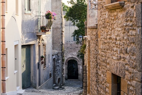 An ancient medieval cobblestone backstreet in Erice, a charming village set at 750 metres above sea level.