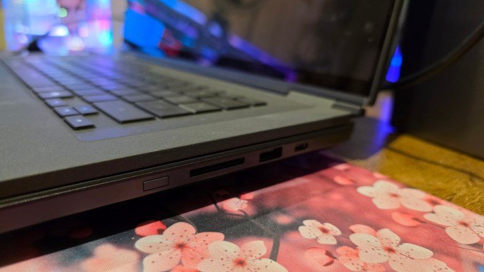 The power button is located on the right hand side of the laptop, and the front-most button.