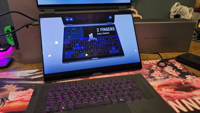 The bottom screen is showing "2 fingers easy switch".