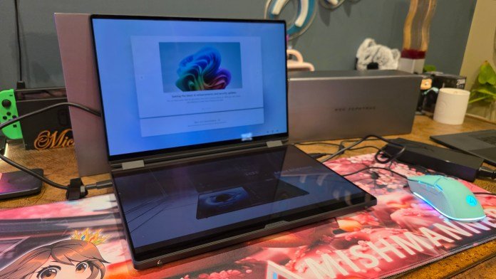 A normal looking laptop, except theres a screen where the keyboard usually is.