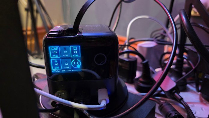 There are three cables running into the power cube, and one of the retractable cables is also in use. There is now a free power outlet on the right hand side.