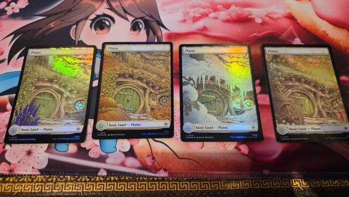 These seasonal cards feature the same scenery: the entrance to a Hobbit home, but with different aesthetics for each season. The Spring one shows lavender and new growth, the autumn shows orange leaves and pumpkins, the winter shows snow, and the summer shows a golden sunshine over the scene.