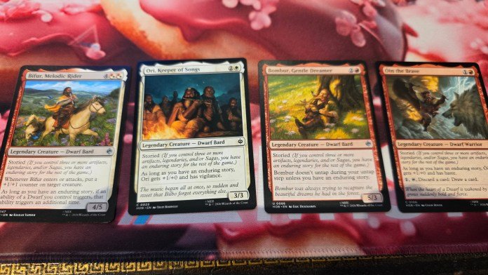 Storied cards including Bifur, Melodic Rider, Ori, Keeper of Songs, Bombur, Gentle Dreamer, and Oin the Brave. They each describe what storied does, which is written in the first dot point here.