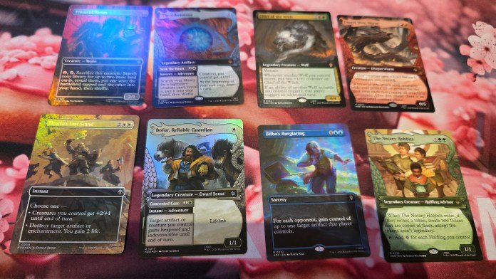 There are eight cards of varying art types showing some of the artwork in the set.