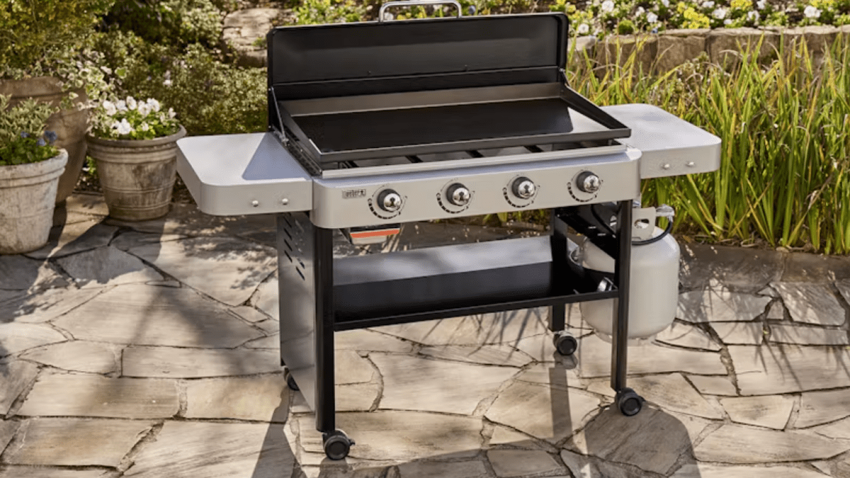 a large weber griddle anchors a serene patio