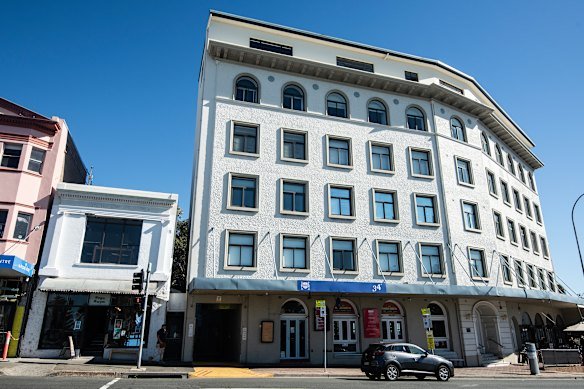 A photo of the proposed development site (left) and the Astra building (right).