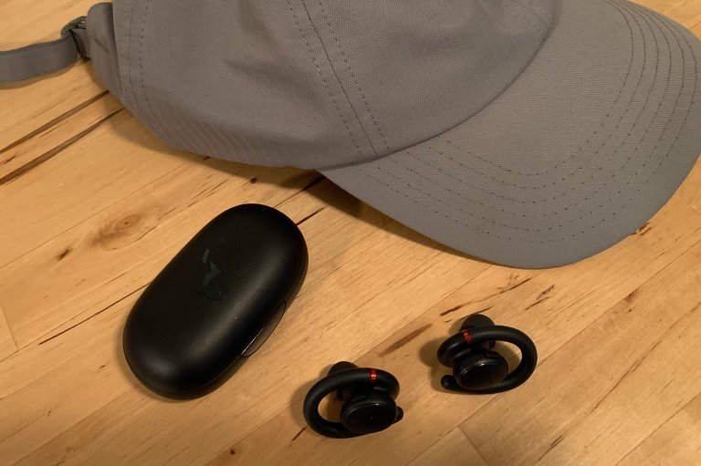 soundcore by Anker Sport X10 earbuds with a running hat
