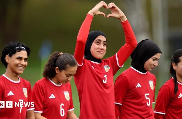 Banned from football at home, Afghan women’s team reunite 8,000 miles away