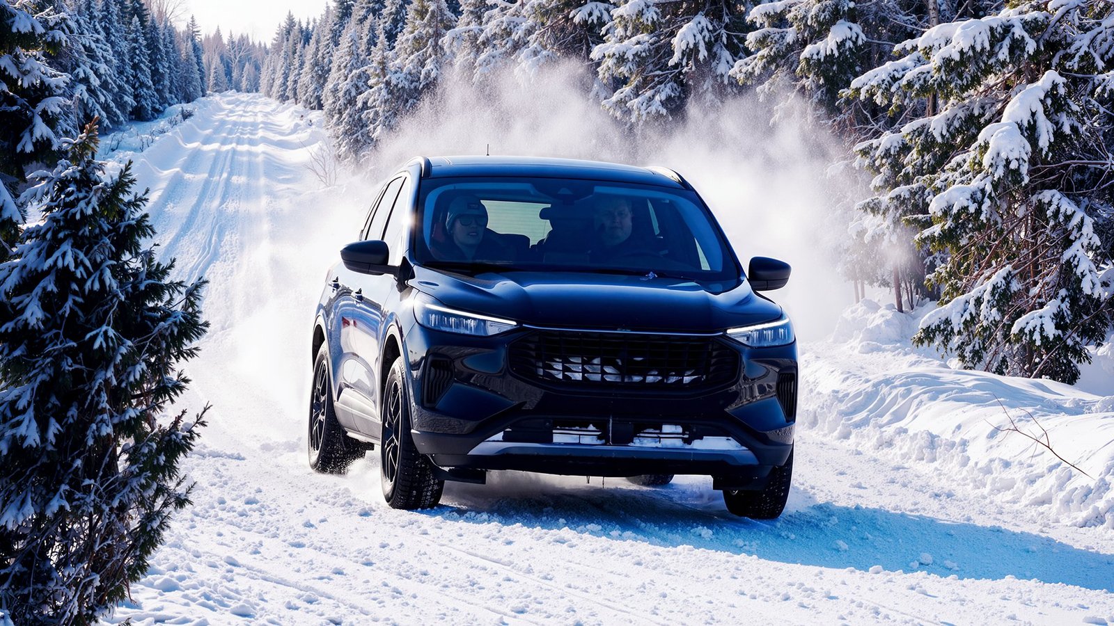 Black SUV driving in the snow